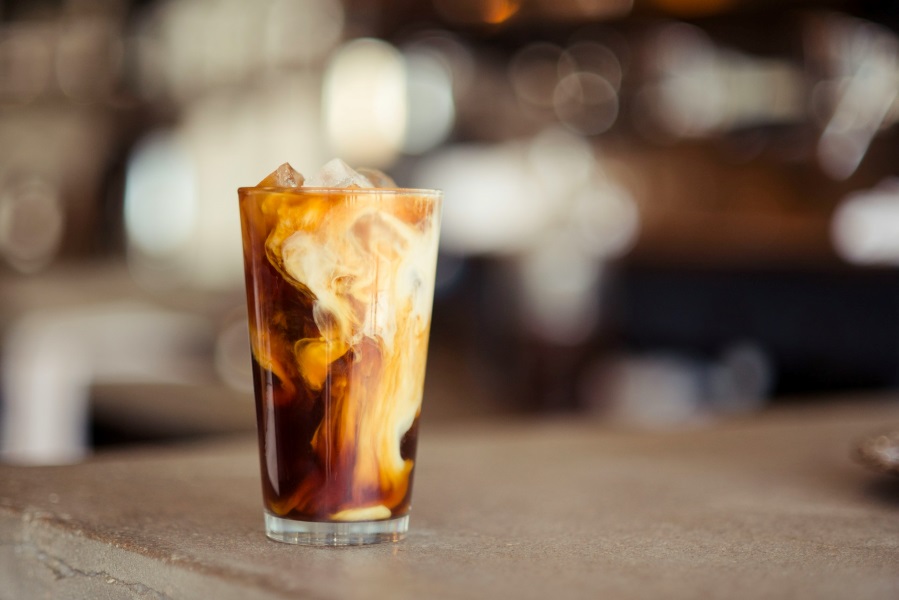 Delicious iced coffee with creamer